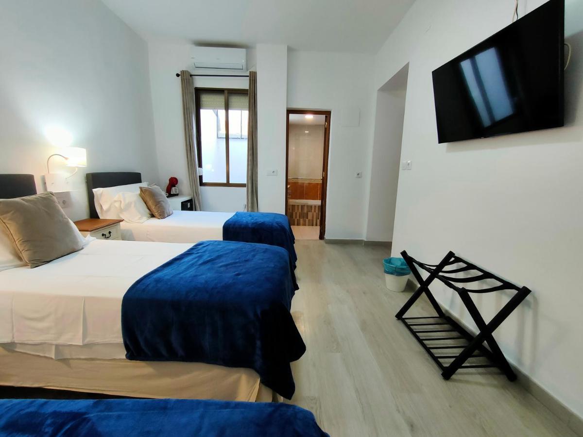 Habitación Doble con cama supletoria - 2 camas